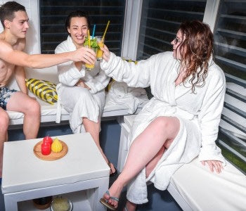 Man and Women having fun at Infrared Sauna