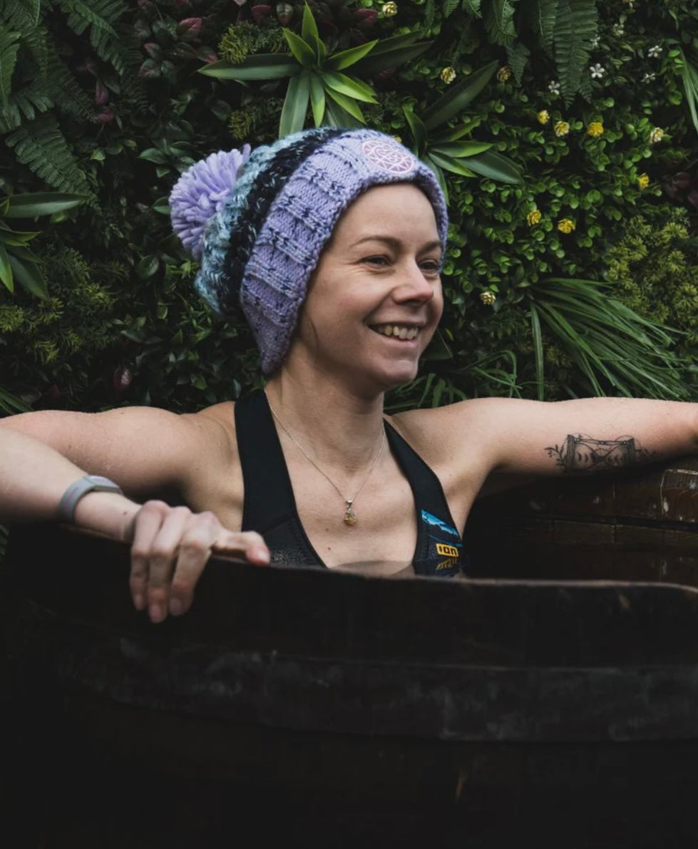 Woman in Cold Plunge Tub vs Ice