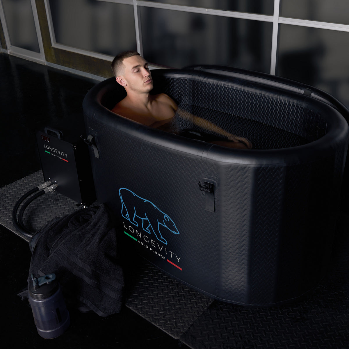 Man in the Cold Plunge Tub Relaxing