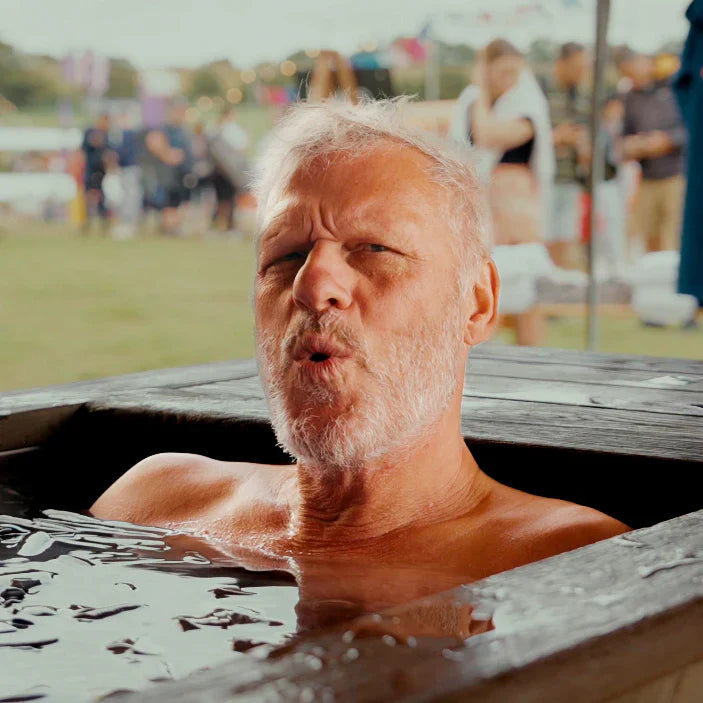 Man in the cold plunge tub with Ice