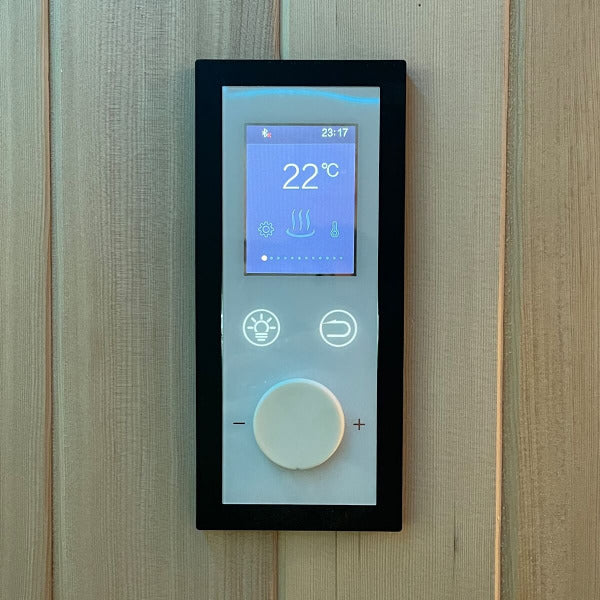 Modern digital sauna control panel showing 22°C temperature and light settings.