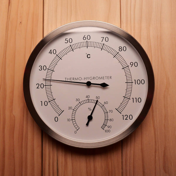 Thermo-hygrometer gauge showing sauna temperature and humidity