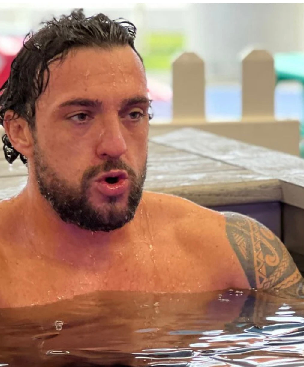 Man chilling on the Cold Plunge Tub