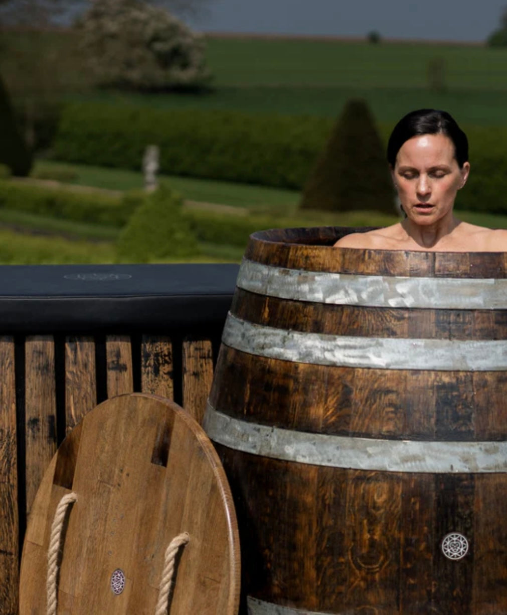 Woman in Cold Plunge Tub vs Ice