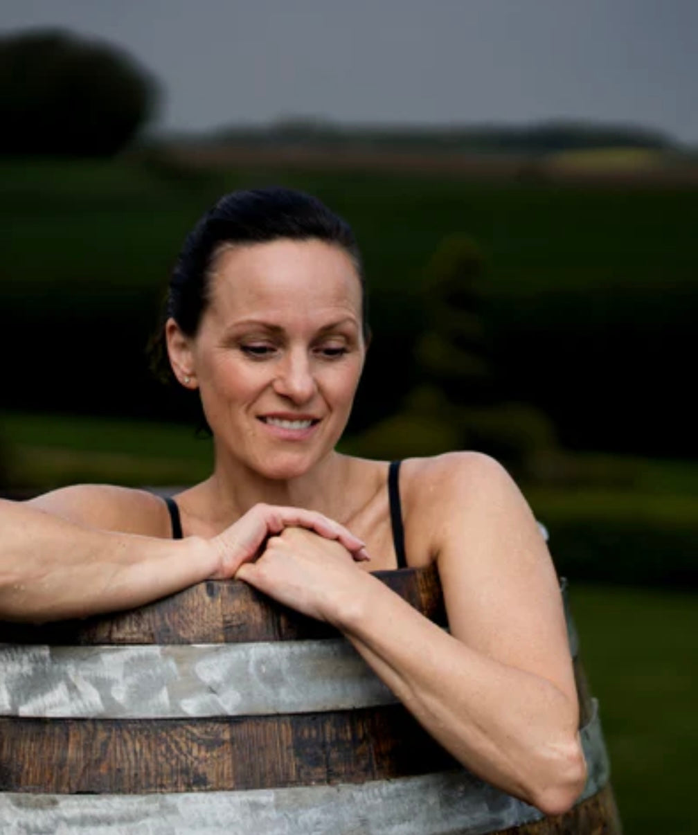 Woman in Cold Plunge Tub outside