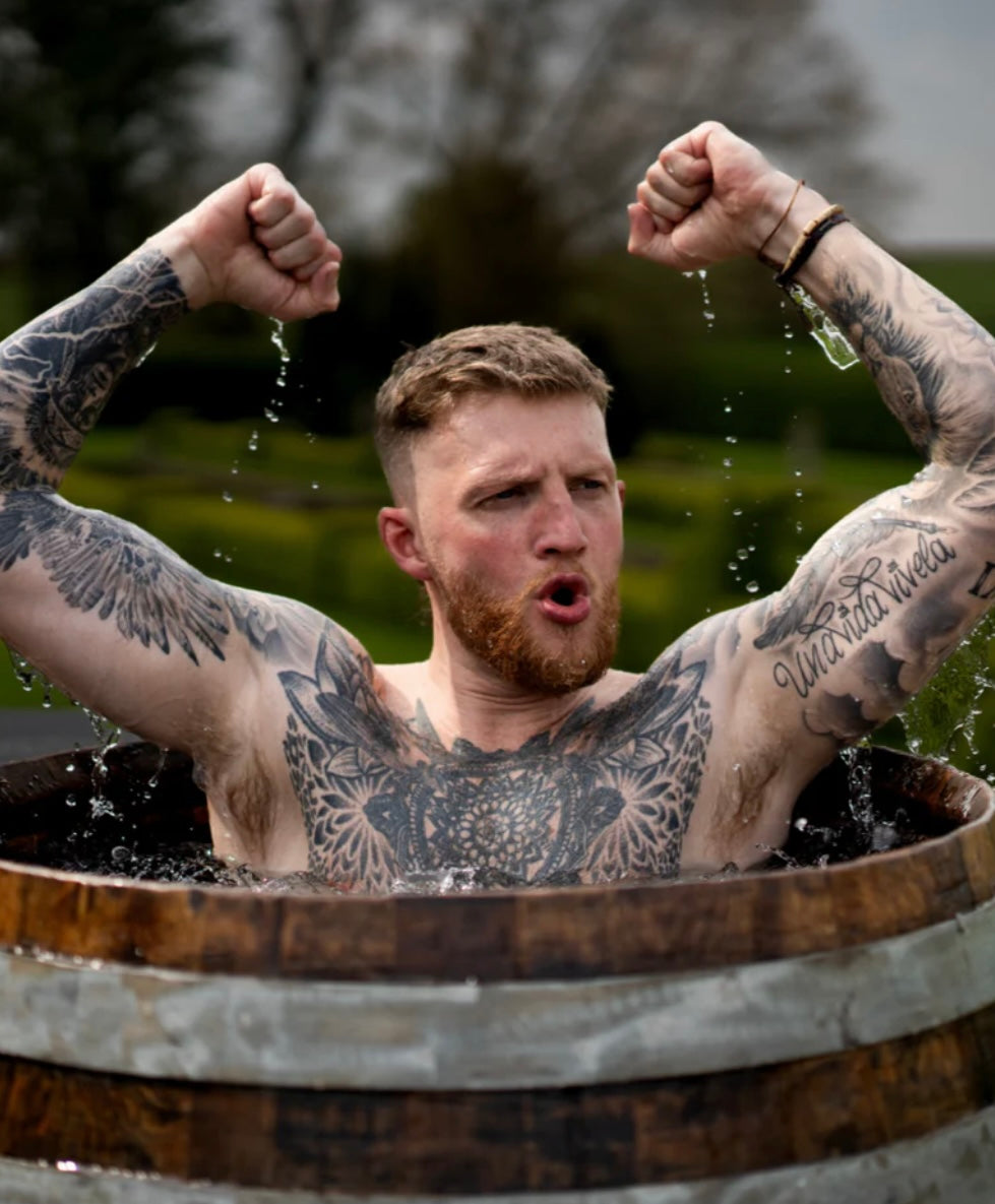 Man stretching his back on the Cold Plunge Tub