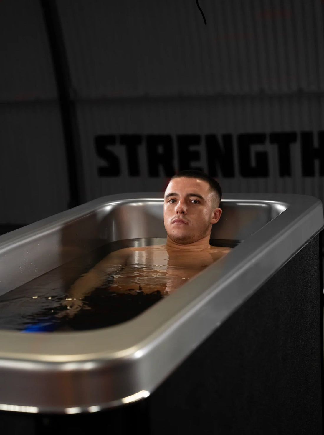 Man finding relief in Cold Plunge Tub