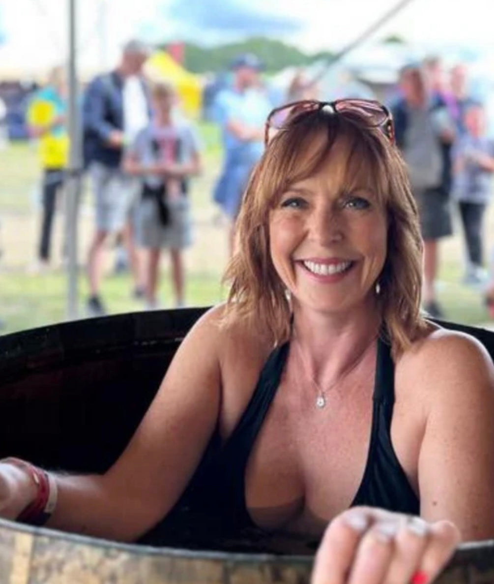 Satisifed Woman in Cold Plunge Barrel Tub