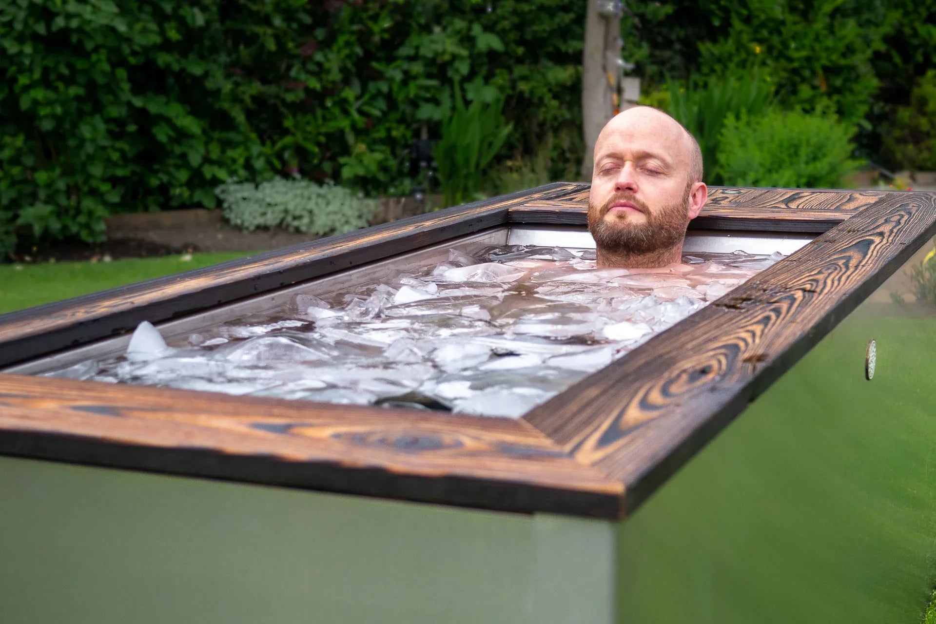 Man in the tub with ice and water
