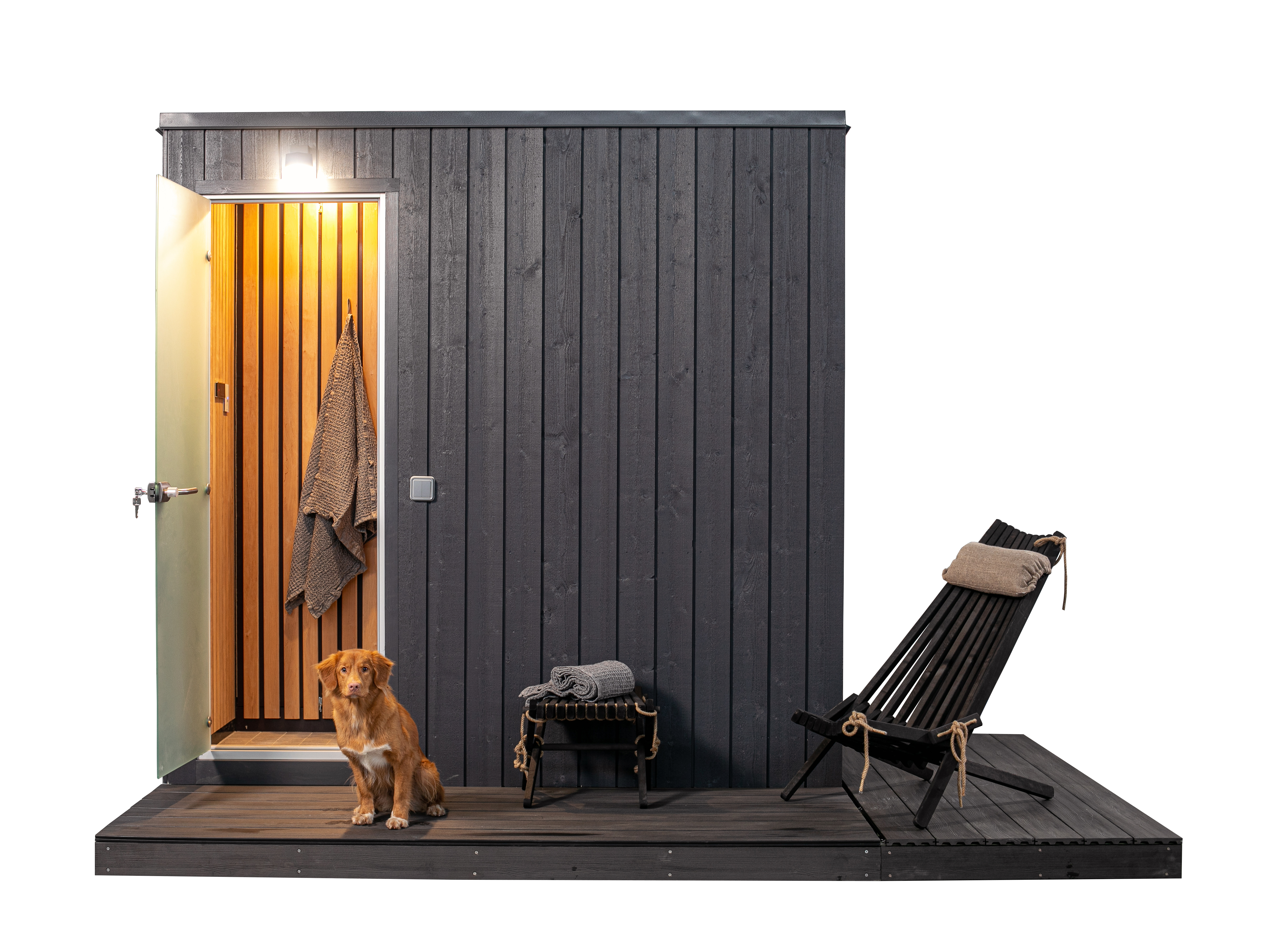 KUUT Outdoor Steam Sauna with open door revealing wood interior, dog sitting on the deck, and lounge chair, on a transparent background.