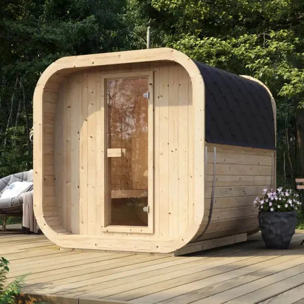 InMedias Sauna Icon 200 S outdoor wooden sauna cabin with glass door and curved roof.