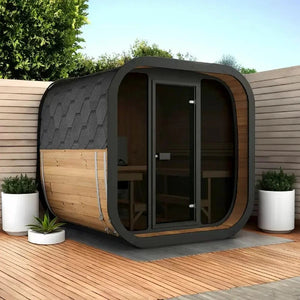 InMedias Sauna Icon 200 XL outdoor wooden sauna cabin with black framed glass door and modern curved design.