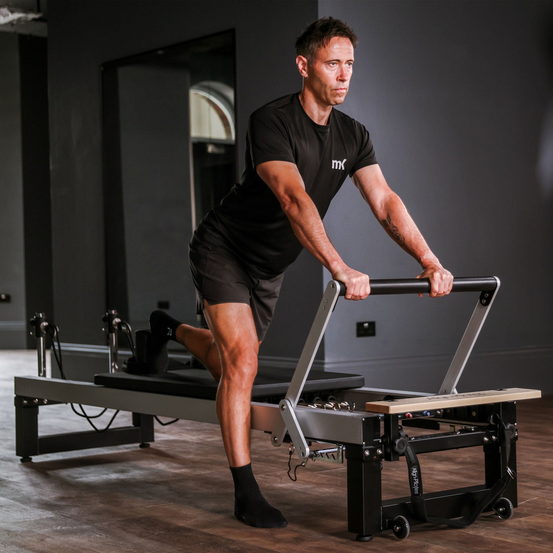 Align-Pilates A8-Pro large Pilates reformer with standard legs, side profile