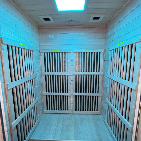 Mid-angle interior shot of Insignia KY004 infrared sauna with multiple carbon heater panels