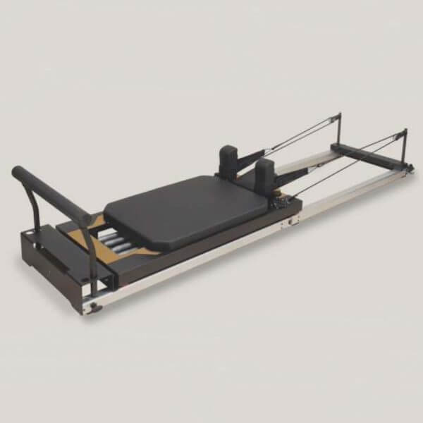 Atro Foldable Pilates Reformer – sleek black folding reformer bed with aluminium frame and wood accents