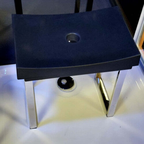 Black shower stool with chrome legs inside Insignia KSY1820 infrared steam cabin