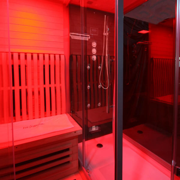 Interior of Insignia KSY1820 sauna and steam cabin under red chromotherapy lighting